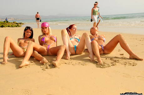 Bikini Pleasure pleased to share with you a free photo gallery with female youth in passionate lesbian foreplay